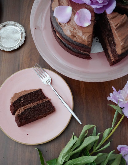 Batta cult classic chocolate cake with dark chocolate espresso buttercream. Made with all natural cake and baking mixes