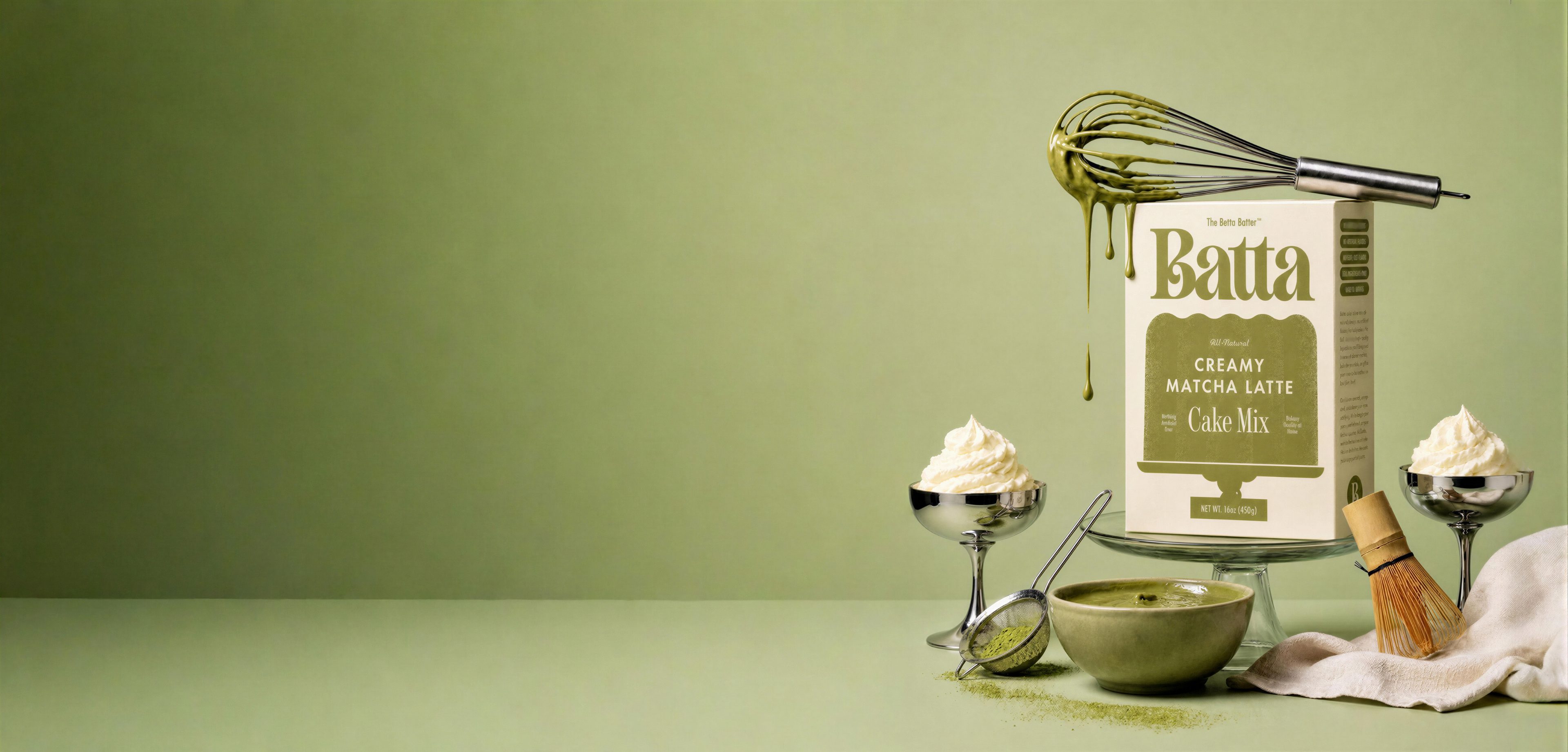 Batta Cake Mix with matcha latte flavor on a green background. all natural cake mix for bakers, moms, and gifts