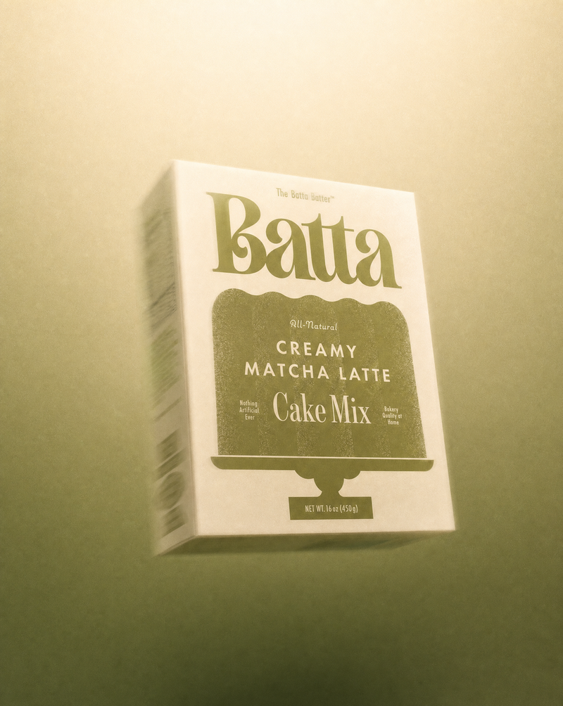 Box of Batta Creamy Matcha Latte Cake Mix on a beige background. Batta all-natural cake and frosting mixes - gourmet gifts for bakers, moms, foodies