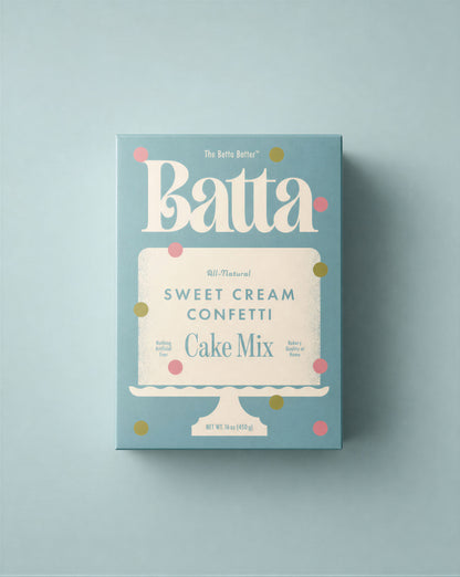 Batta Sweet Cream Confetti Cake Mix box on a light blue background. Batta all-natural cake and frosting mixes - gourmet gifts for bakers, moms, foodies