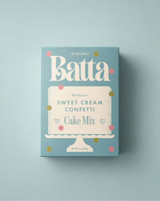 Batta Sweet Cream Confetti Cake Mix box on a light blue background. Batta all-natural cake and frosting mixes - gourmet gifts for bakers, moms, foodies